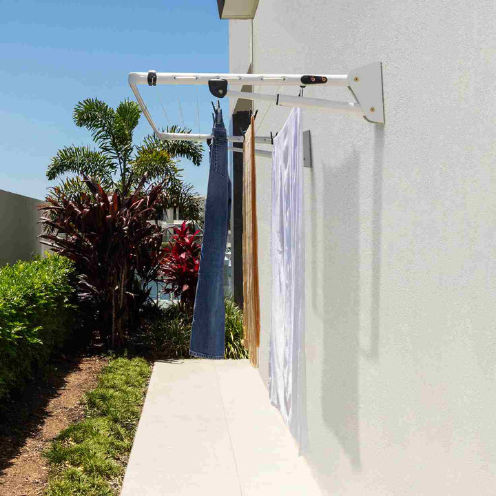 Hills Compact Clothesline with laundry on it