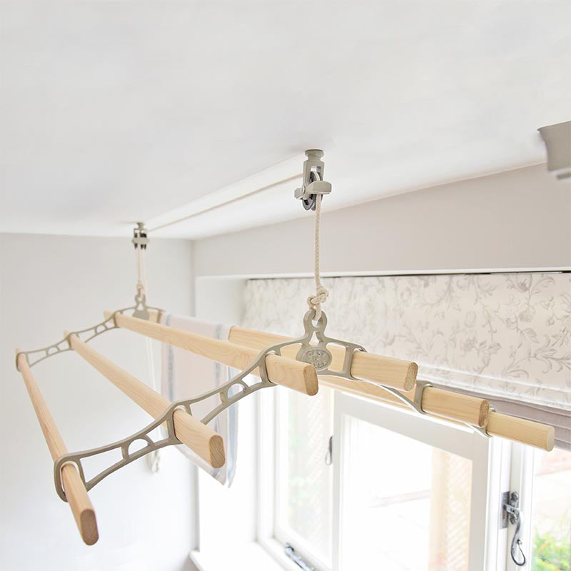 6 lath supreme ceiling clothes airer in cream colour installed on ceiling in a laundry