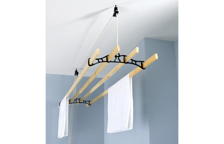 traditional 4 lath ceiling airer in black colour installed into ceiling in laundry